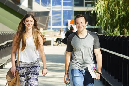 Female and male walking outdoors