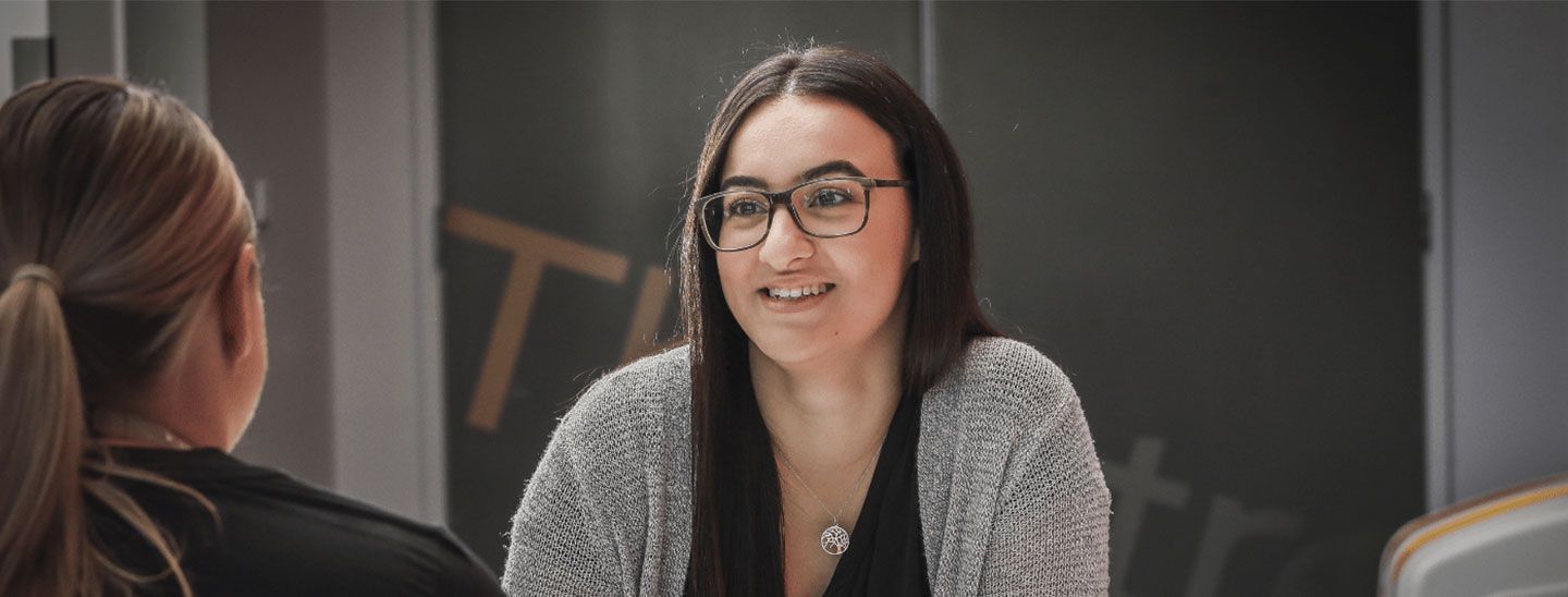 Female staff student conversation