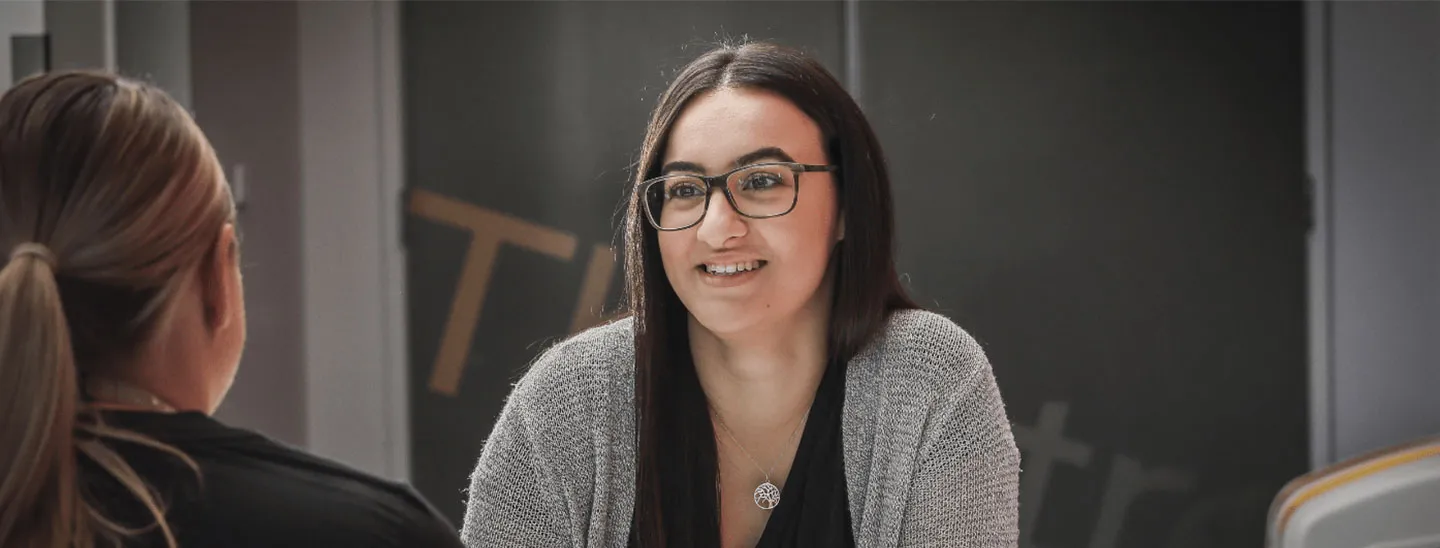 Female staff student conversation