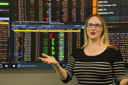 Female teacher IT marketing trading screens
