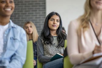 Group in classroom listening