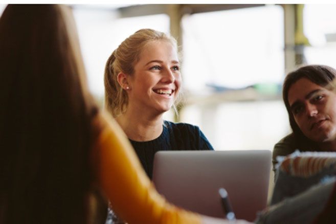 Group on laptops in class