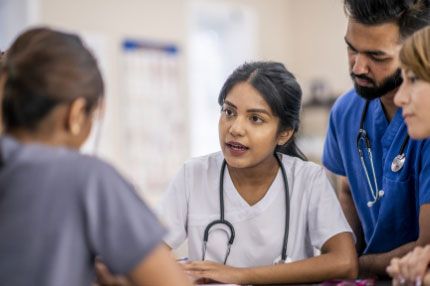 Mature female nurse working