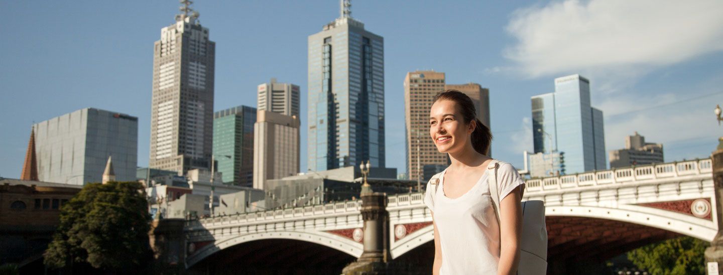 Young female walking in-Melbourne city
