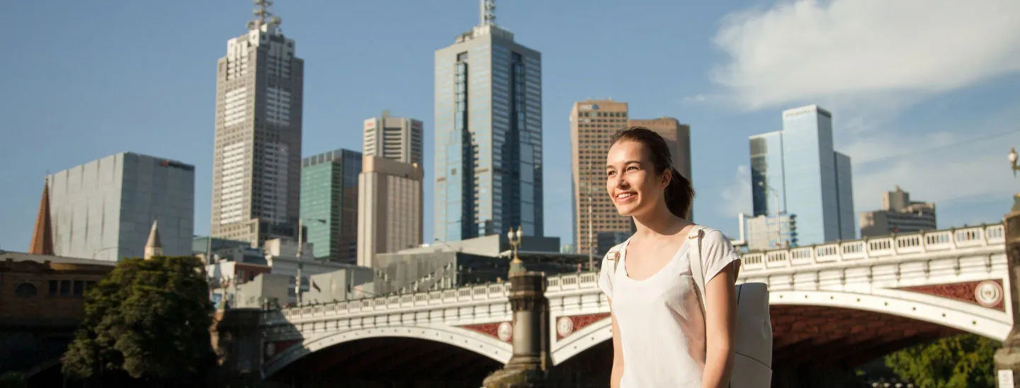 Young female walking in-Melbourne city